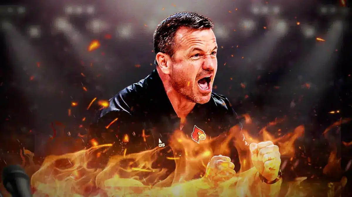 - Louisville women’s basketball coach Jeff Walz, with flames around him like he’s mad