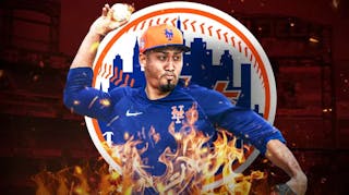 Mets closer Edwin Diaz on fire in front of a Mets logo