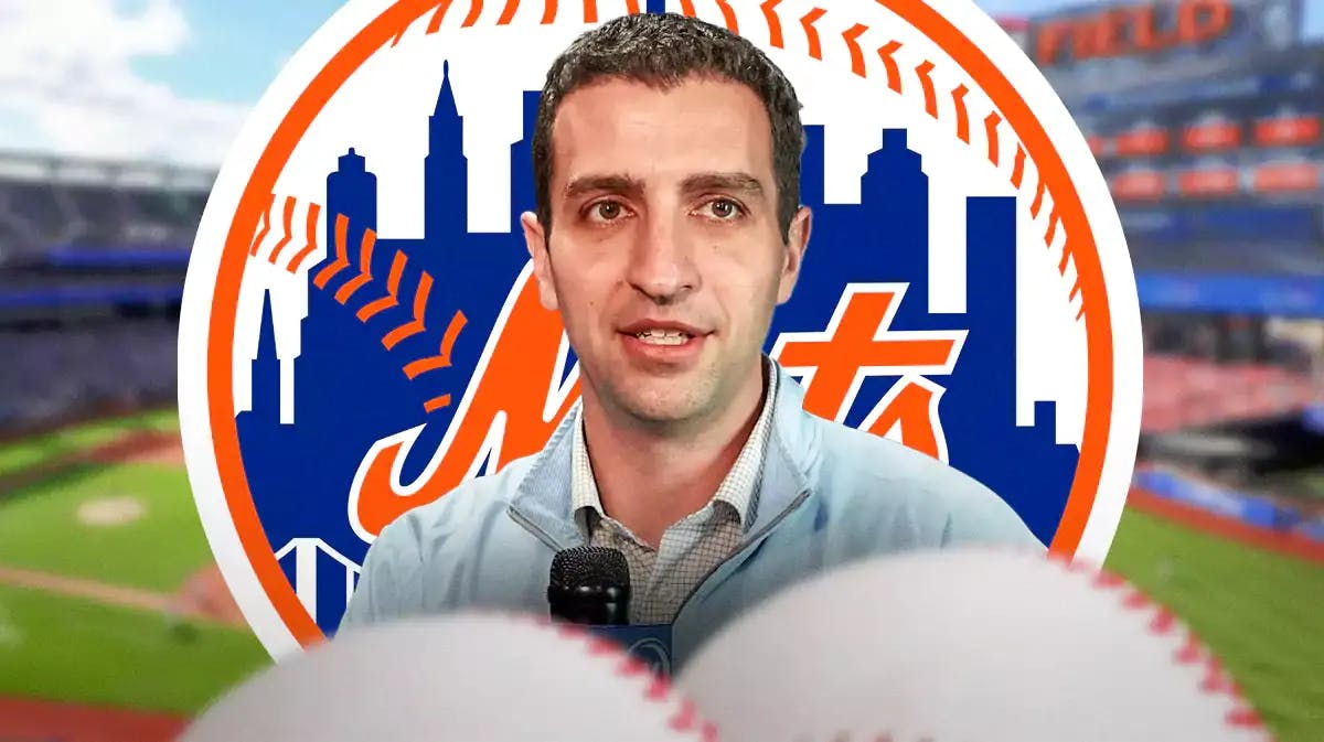 David Stearns in front of a Mets logo at Citi Field