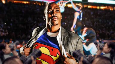 Superman Dwight Howard with back to back Slam Dunk Contest champion Mac McClung behind him