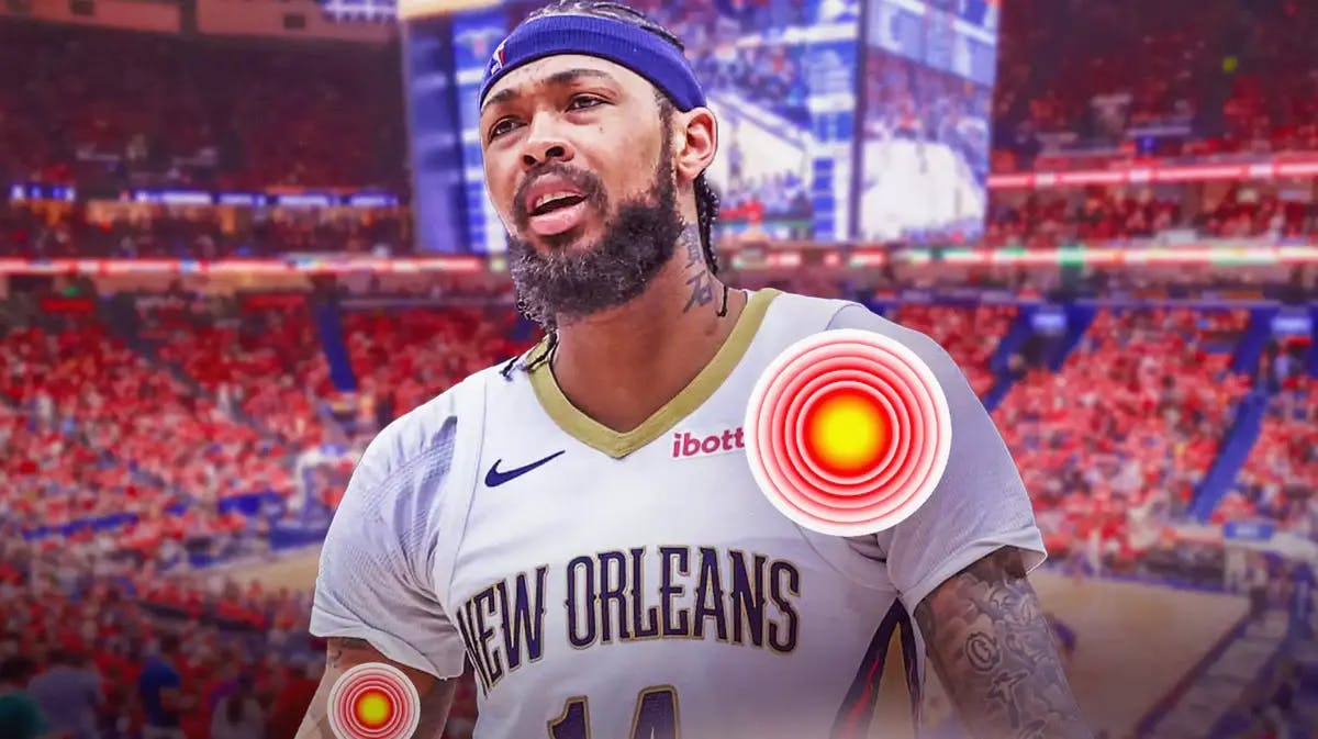 Brandon Ingram (Pelicans) looking serious/hurt with aching red symbol on his body