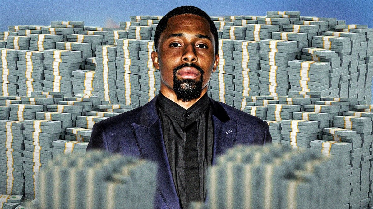 Spencer Dinwiddie surrounded by piles of cash.