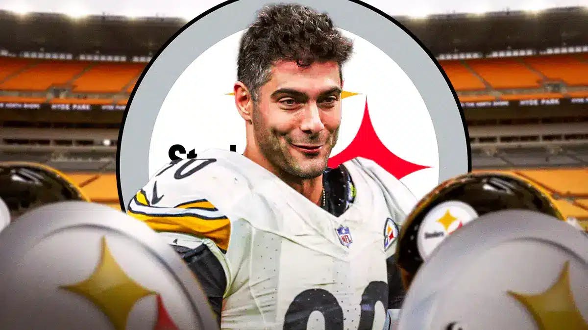 Jimmy Garoppolo wearing a Steelers jersey in front of a Steelers logo at Acrisure Stadium