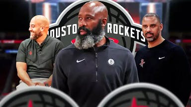 Ex-Nets head coach Jacque Vaughn in front of a Rockets logo next to Rafael Stone and Ime Udoka.