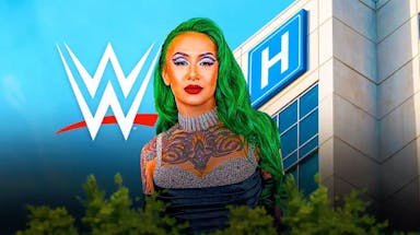 Shotzi Blackheart in front of a hospital with the WWE logo on it.