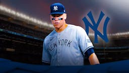 Yankees' Aaron Judge stands at New York's stadium amid injury, AL East fans in the background await Spring Training