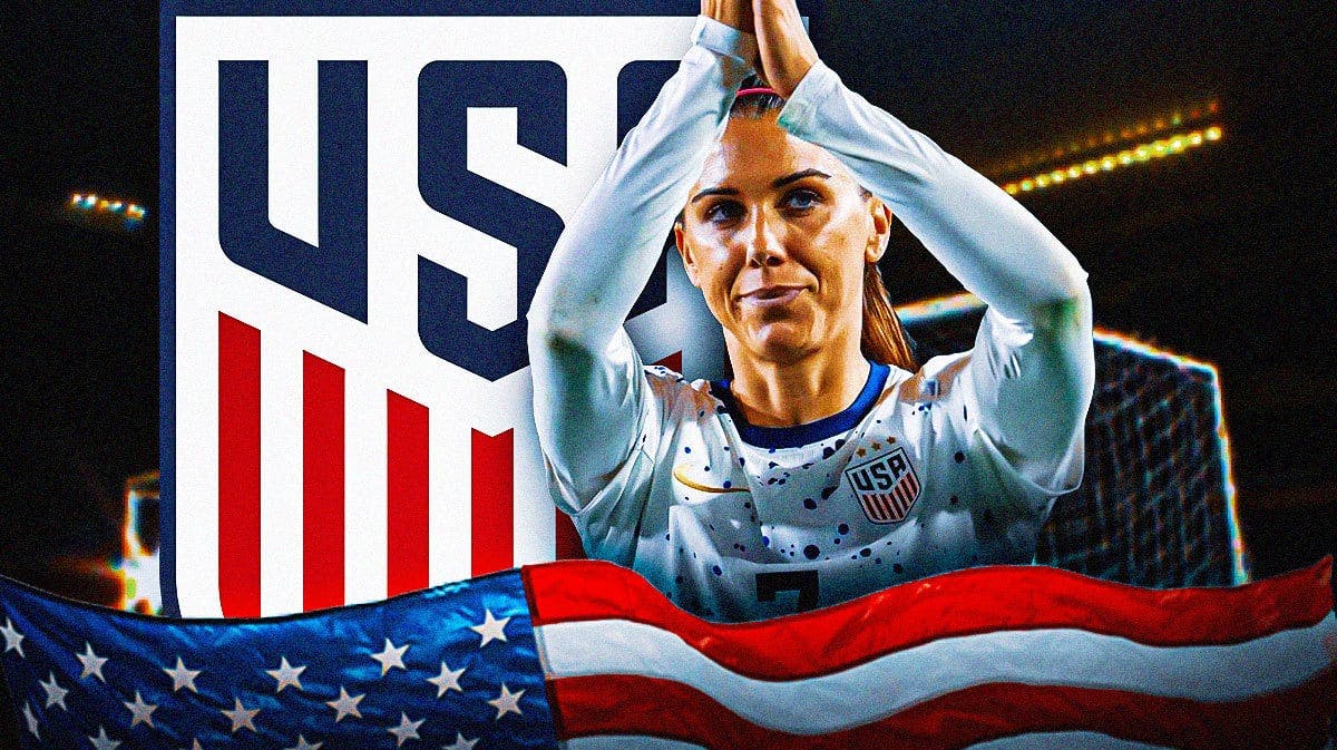 Alex Morgan celebrating in front of the USWNT logo