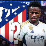 Vinicius Jr in front of the Atletico Madrid logo, questionmarks and fans in the back