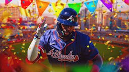Braves' Michael Harris II hyped up (Kevin Seitzer), with confetti and party streamers all over him