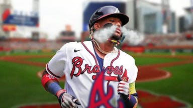 Photo: Ronald Acuna Jr looking hyped with smoke coming out of his nose in Braves jersey
