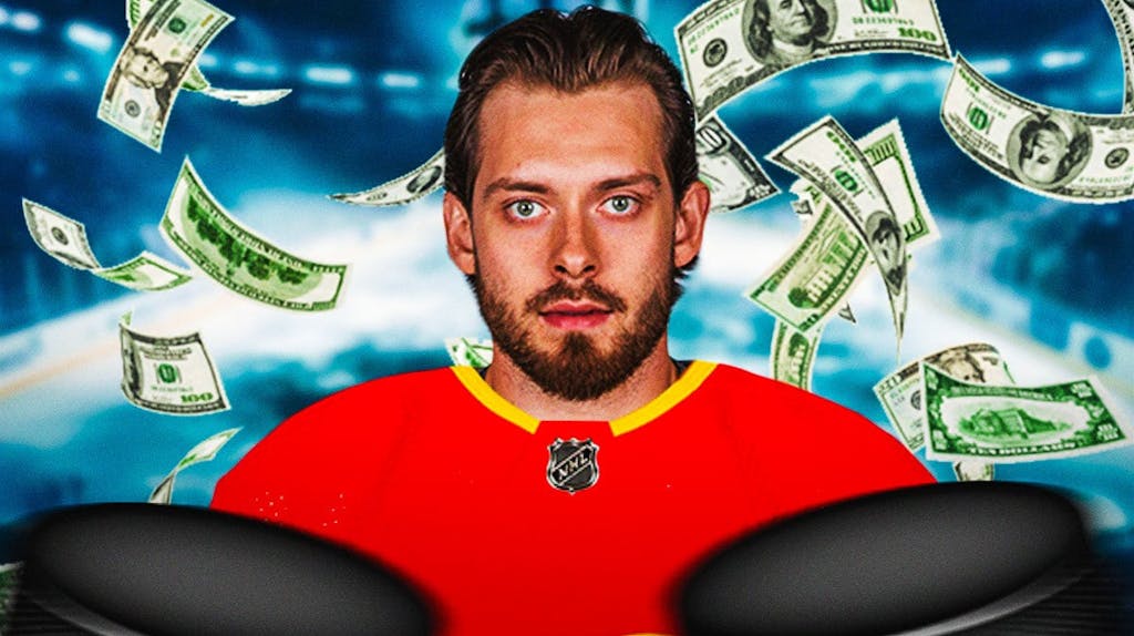 Daniil Miromanov in a Calgary Flames jersey with a bunch of money falling around him