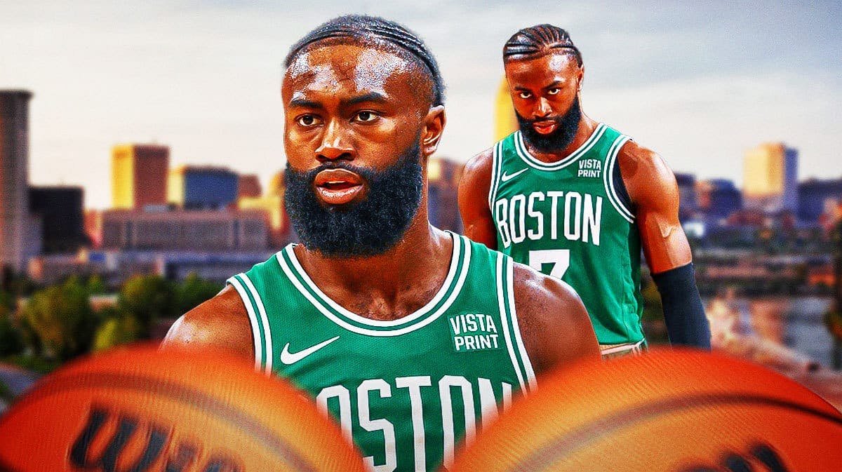 Jaylen Brown looking sad/disappointed on a Cleveland city background