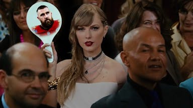 Taylor Swift as a woman bidding with Chiefs TE on the placard
