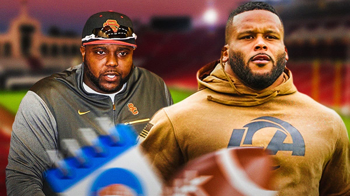 USC Trojans co-defensive coordinator Eric Henderson and recently retired Los Angeles Rams star Aaron Donald