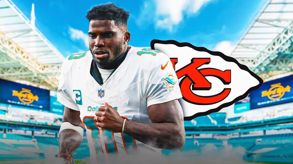 Dolphins' Tyreke Hill stands next to Chiefs logo after KC's Super Bowl run