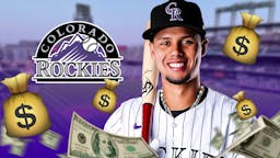 Ezequiel Tovar next to a Rockies logo and moneybags at Coors Field