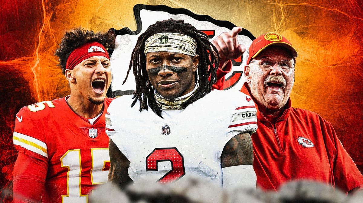 Marquise Brown in the middle, Coach Andy Reid and Patrick Mahomes around him, and Kansas City Chiefs wallpaper in the background.
