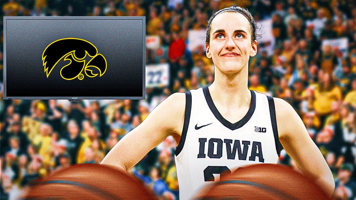 Iowa women’s basketball player Caitlin Clark, looking excited/hyped up, with a cheering crowd and a T.V. in the background.