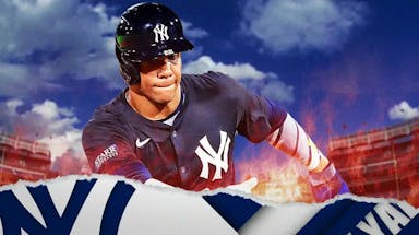 Juan Soto in a Yankees uniform with flames coming off of him