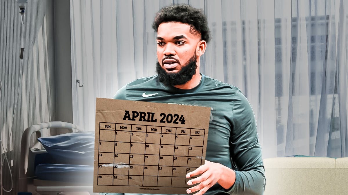 Karl-Anthony Towns sitting on a hospital bed while holding an April 2024 calendar.
