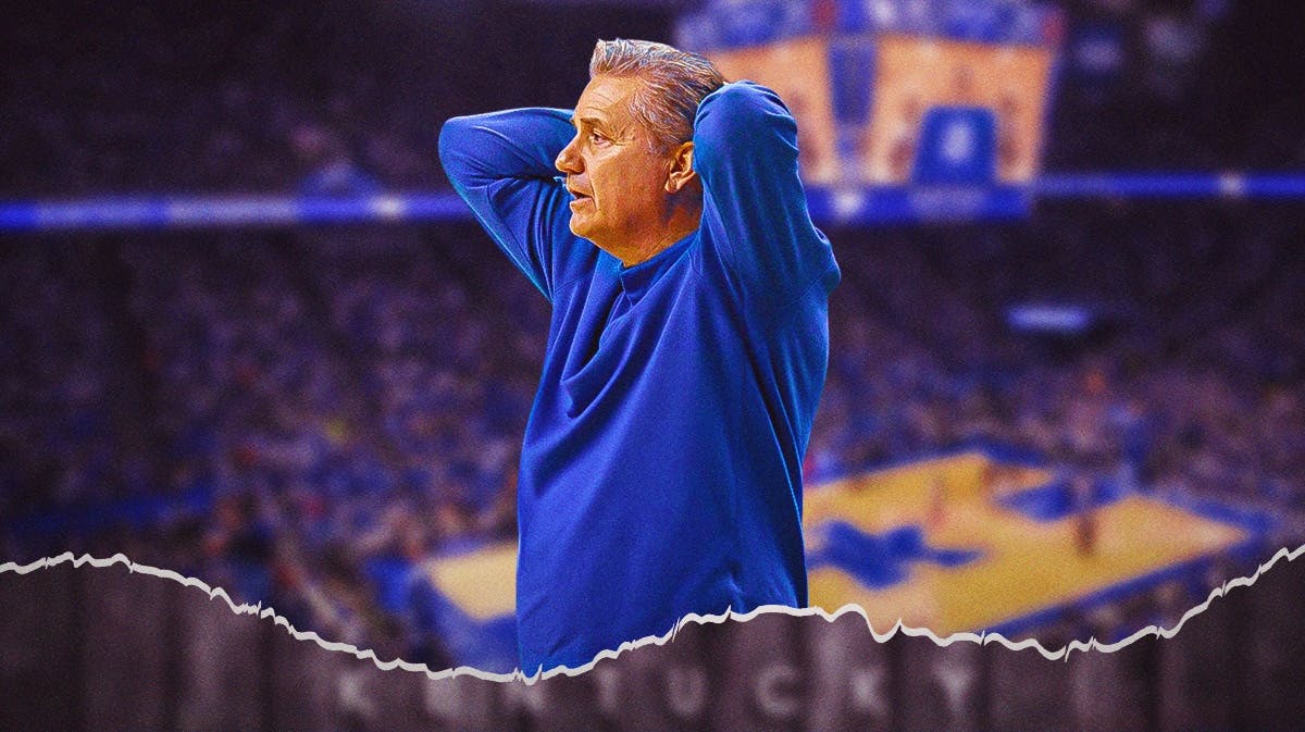 John Calipari looking down and disappointed. Kentucky in the background.