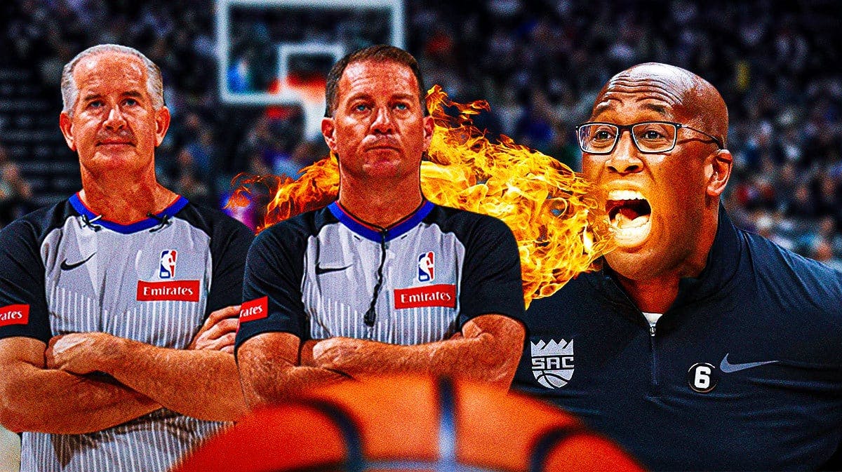 Mike Brown on one side breathing fire, two NBA referees on the other side