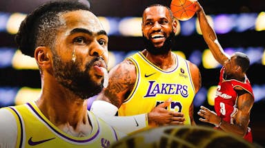Lakers' D'Angelo Russell in tears looking at LeBron James in Lakers, Cavs jerseys
