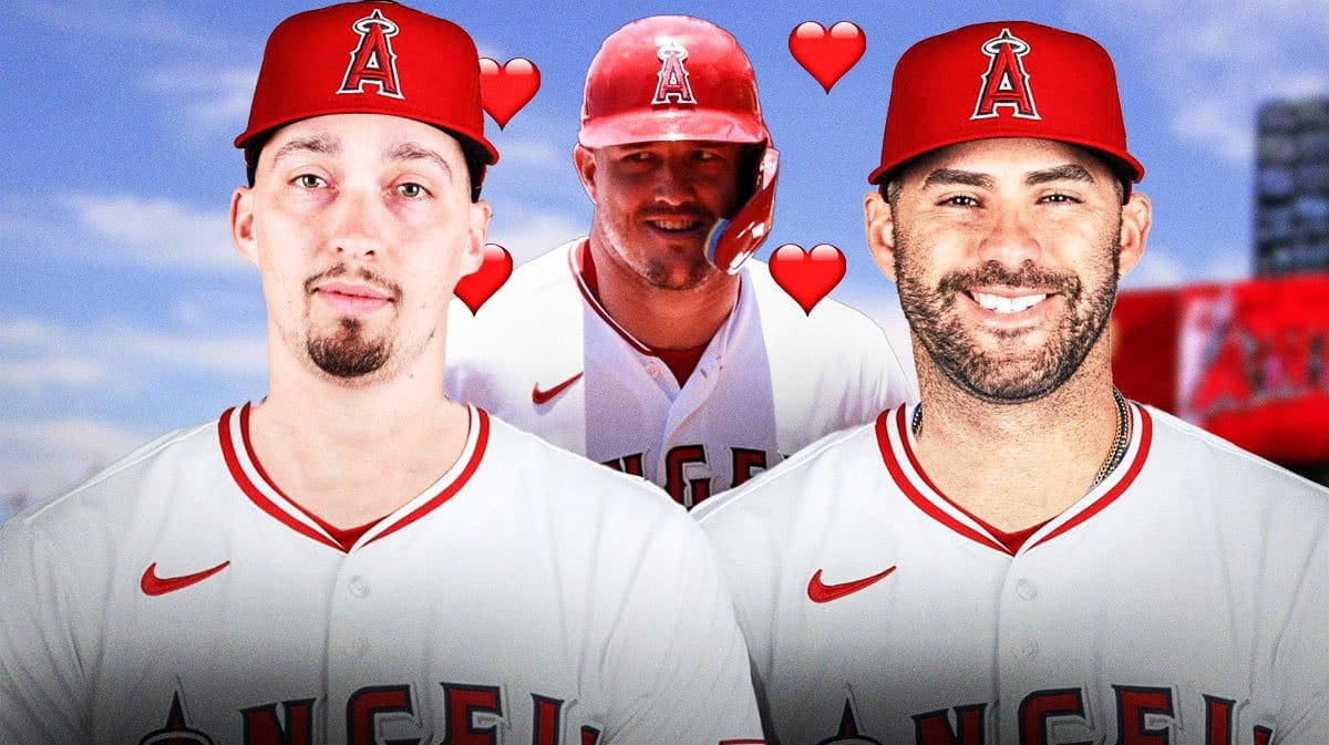 Angels' Mike Trout with hearts around him while smiling at Blake Snell and JD Martinez in an Angels uni