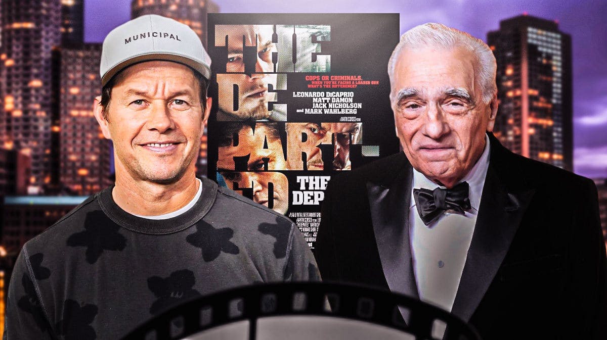 Mark Wahlberg and Martin Scorsese with The Departed poster.