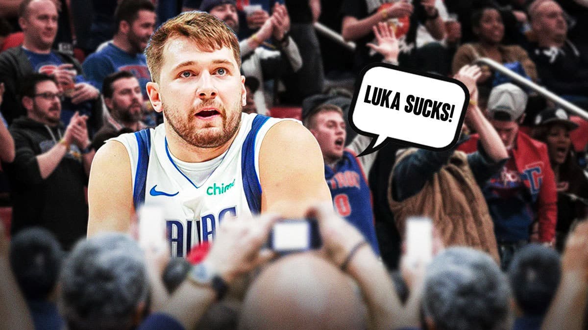 Mavs' Luka Doncic surrounded by Pistons fans saying "Luka sucks!"