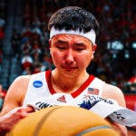 Nebraska basketball player Keisei Tominaga in tears.