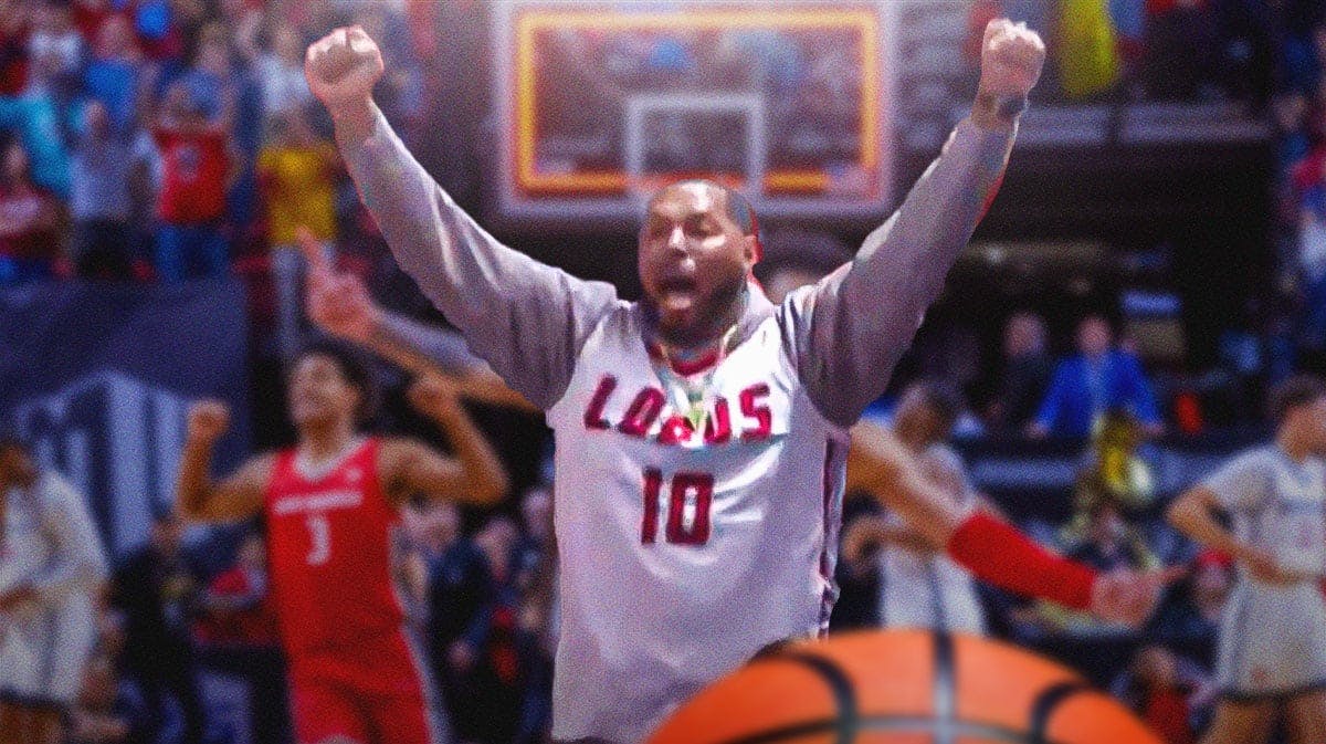 Eddie House, wearing a New Mexico Lobos jersey, celebrating. New Mexico basketball players in background.