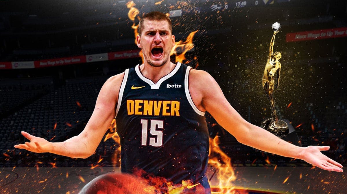 Nikola Jokic on fire and yelling as well and the NBA MVP award next to him.