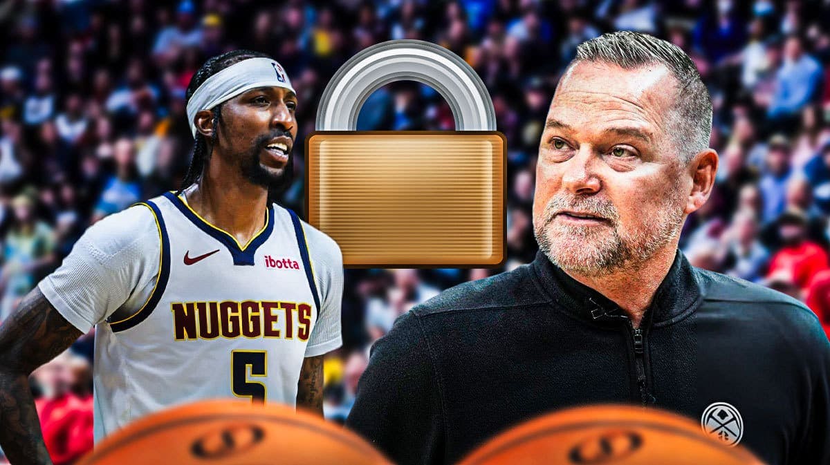 Nuggets Kentavious Caldwell-Pope and Michael Malone with a lock between them