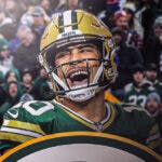 Packers quarterback Jordan Love smiling, with fans of the team in the background.