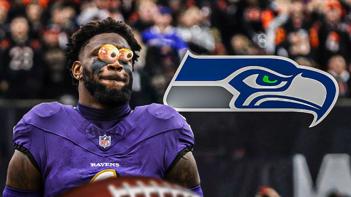 Baltimore Ravens linebacker Patrick Queen with his eyes bugged out looking at Seattle Seahawks logo.