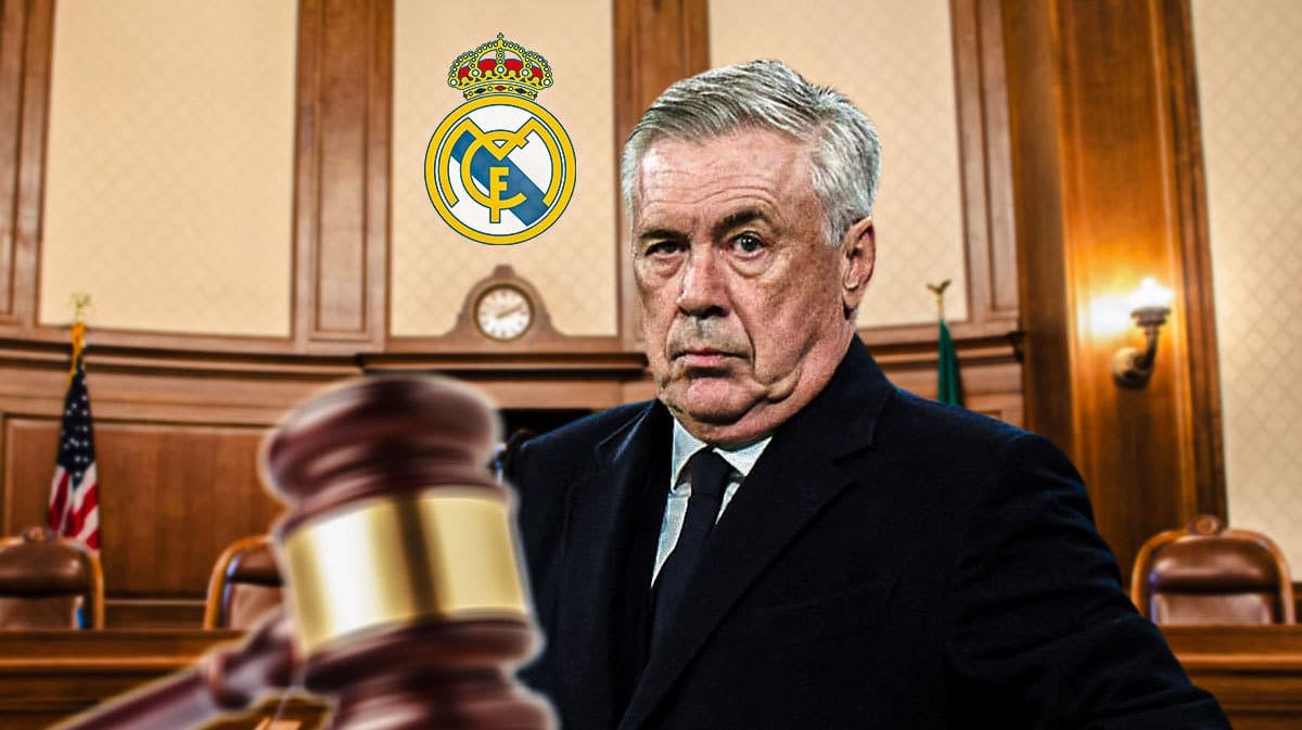 Carlo Ancelotti in a courthouse, the Real Madrid logo on the wall la liga