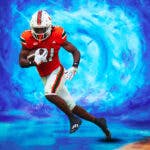 Henry Parrish Jr. (Miami Hurricanes running back) in front of a portal with Ole Miss logo