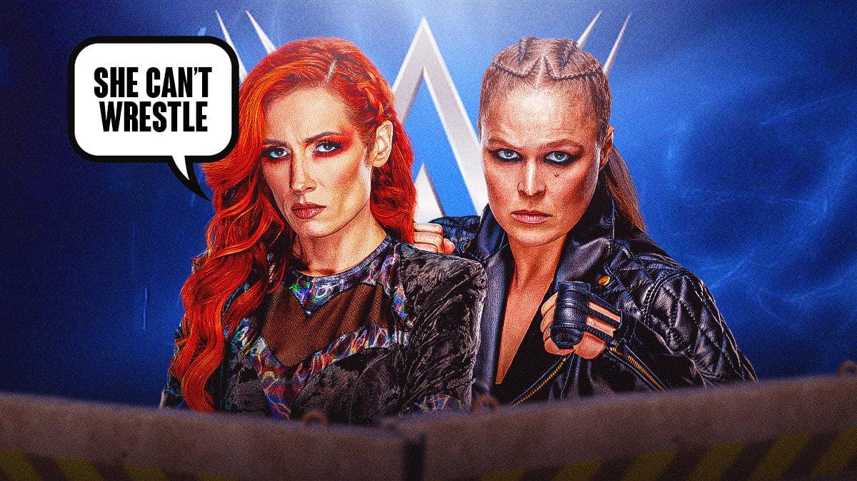 Becky Lynch with a text bubble reading “She can’t wrestle” next to Ronda Rousey with the WWE logo as the background.