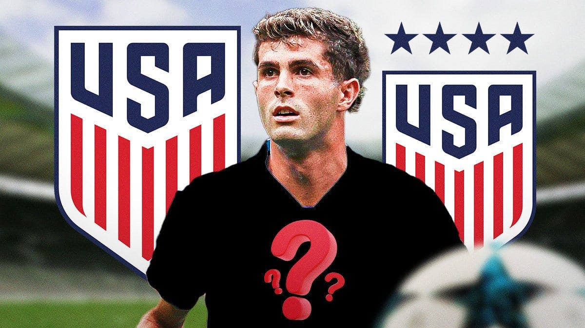 Christian Pulisic wearing a full black t-shirt with a questionmark on it, the USMNT and USWNT logos behind him
