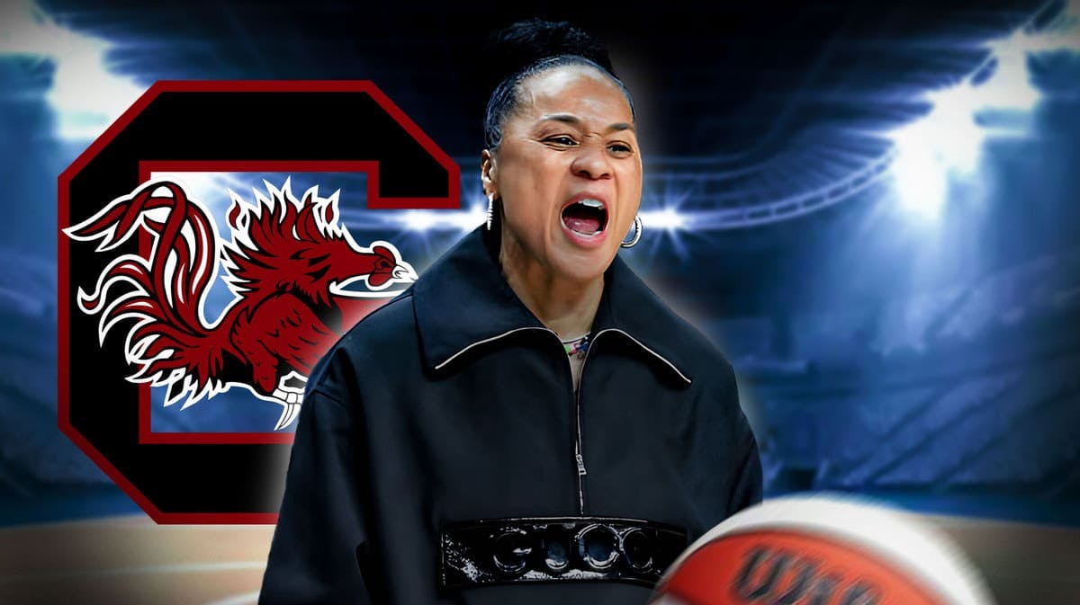 South Carolina women's basketball head coach Dawn Staley in front of MVP Arena next to the logo of the school.