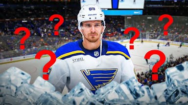 Action shot of Pavel Buchnevich (Blues) with question marks around him