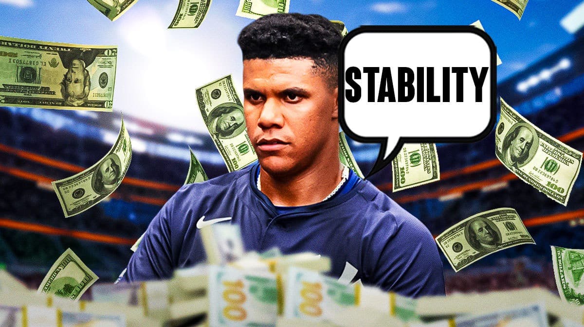 Photo: Juan Soto in Yankees jersey saying “Stability” with money flying around him