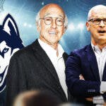 UConn basketball's David Hurley stands next to Larry David after Illinois, Elite 8 win