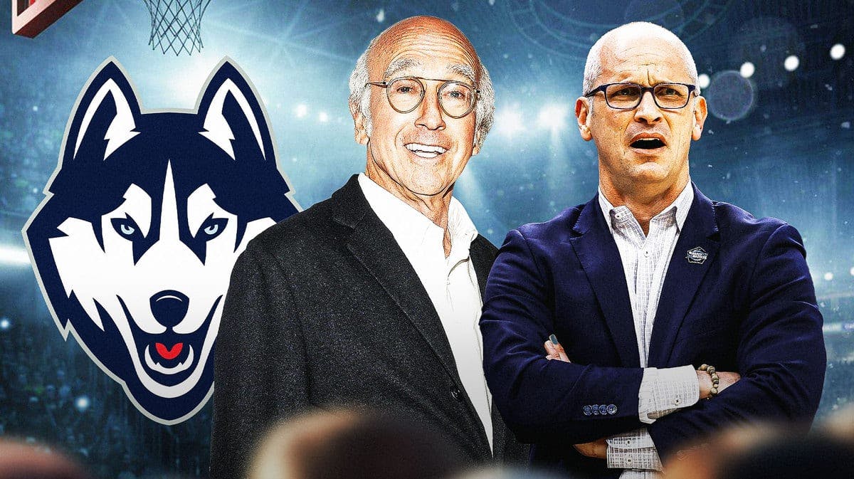 UConn basketball's David Hurley stands next to Larry David after Illinois, Elite 8 win