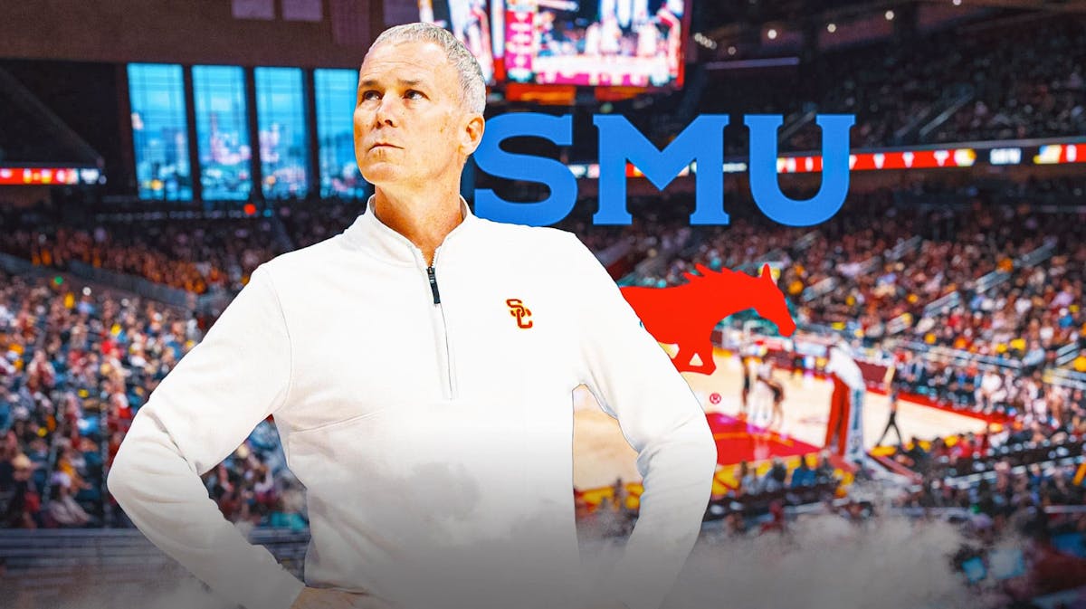 Andy Enfield with the SMU logo in the background, USC