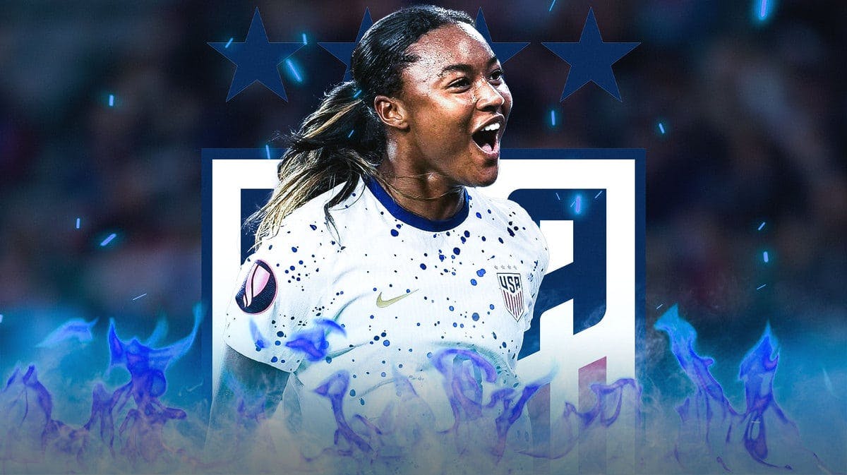 Jaedyn Shaw celebrating on blue fire in front of the USWNT logo