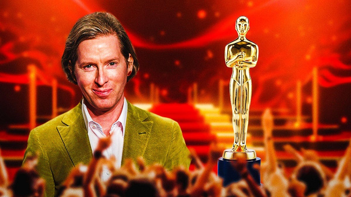 Wes Anderson next to Oscars trophy.