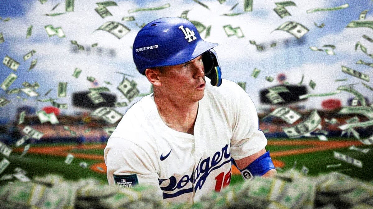 Dodgers catcher Will Smith with money around him.
