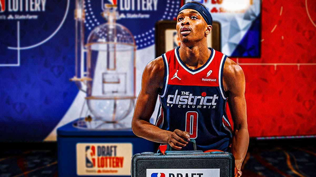 Wizards' Bilal Coulibaly holding the draft lottery machine, with the NBA Draft in the background